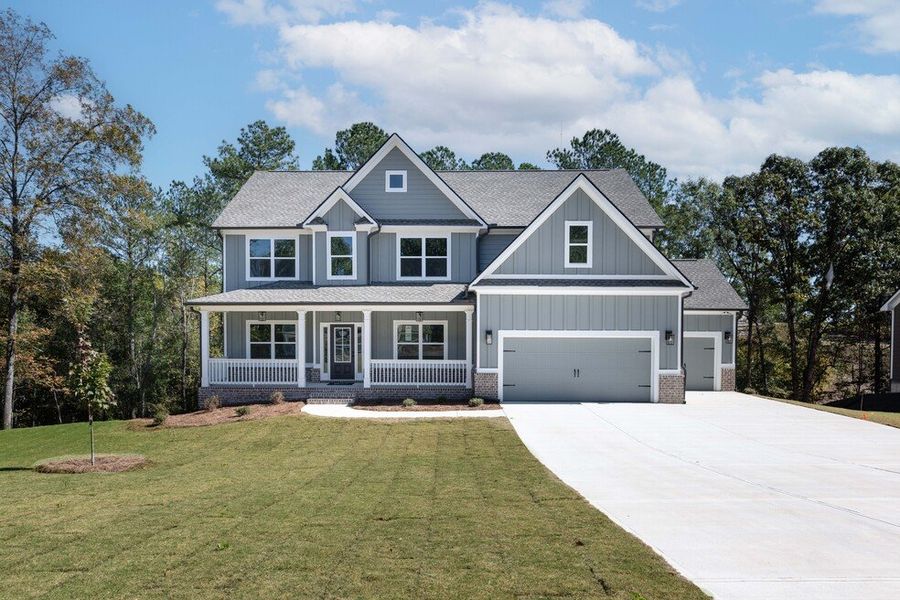 Front exterior of a home in the Woodland Hills community, located in Loganville, GA (Image 13).