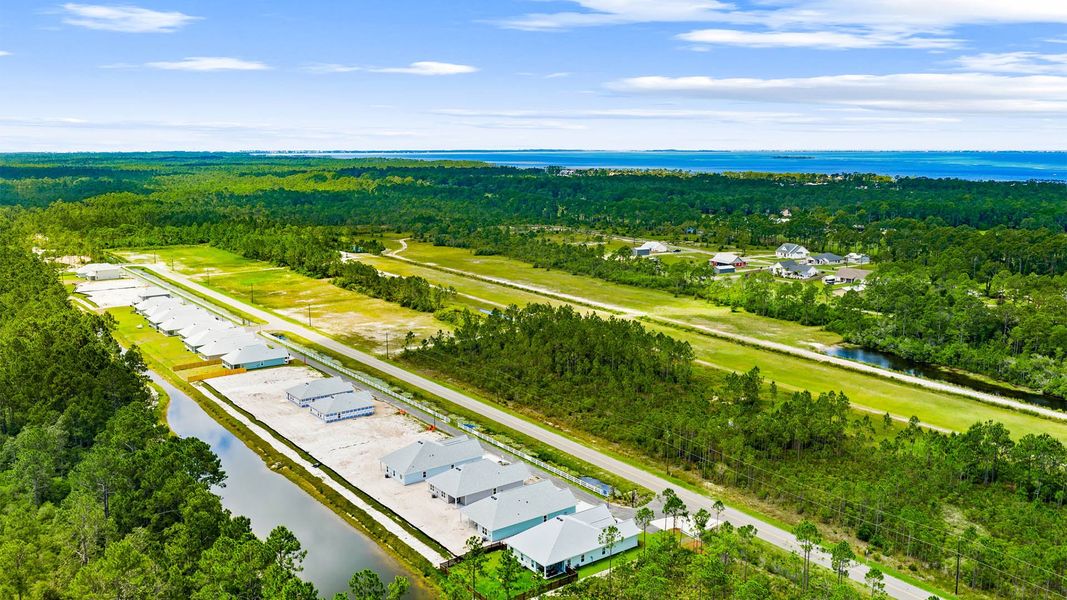 Aerial view of the Buffer Farms community in Port Saint Joe, FL, showing layout and nearby surroundings (Image 11).