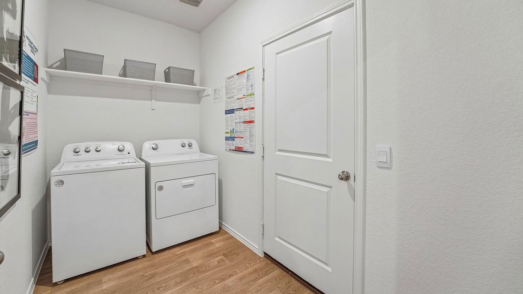 Furnished interior in a model home at Palomino in Manor (Image 34).