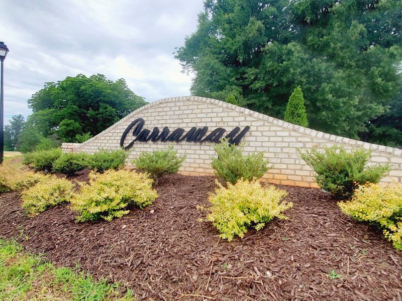 Entrance to the Carraway community in Greensboro, NC, featuring signage and landscaping (Image 2).