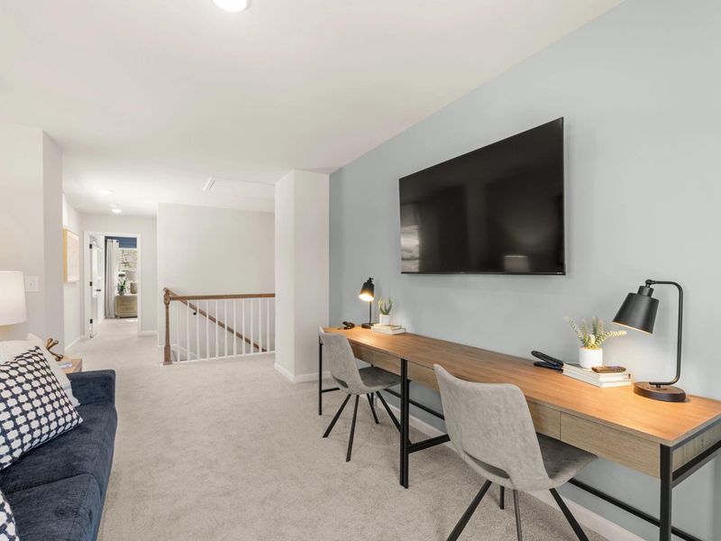 Furnished interior in a model home at The Bluffs in Canton (Image 8).