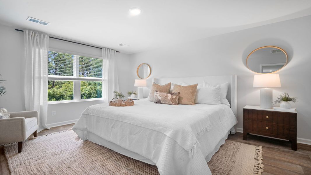 Furnished interior in a model home at The Groves at Bees Creek in Ridgeland (Image 22).