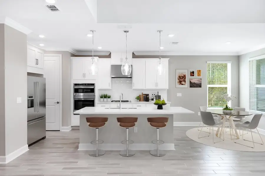 Furnished interior in a model home at Osprey Cove in St. Marys (Image 6).