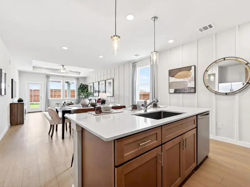 Furnished interior in a model home at Mesa Vista in San Antonio (Image 6).