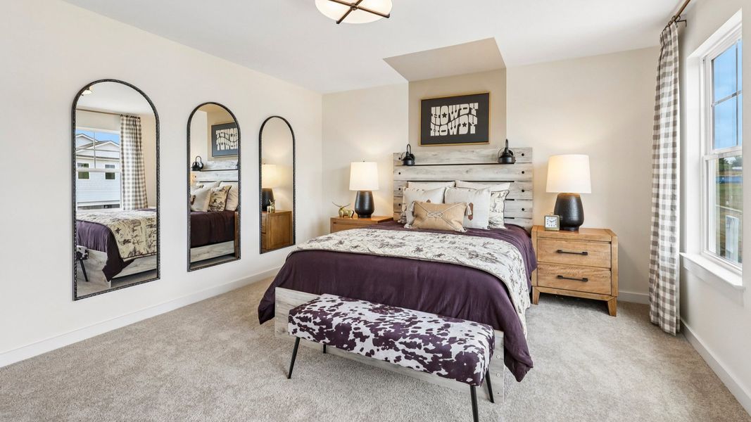 Secondary bedroom with window, carpet, and closet Secondary bedroom with window, carpet, and closet