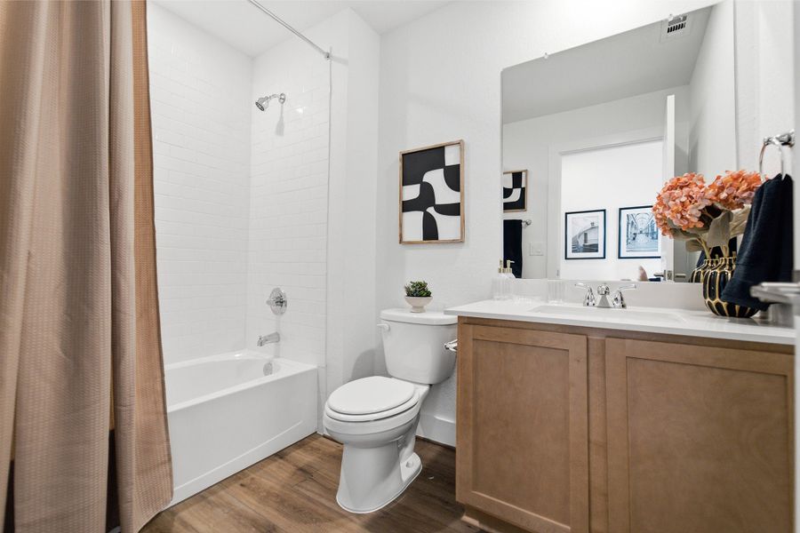Furnished interior in a model home at Lone Oak in San Antonio (Image 39).