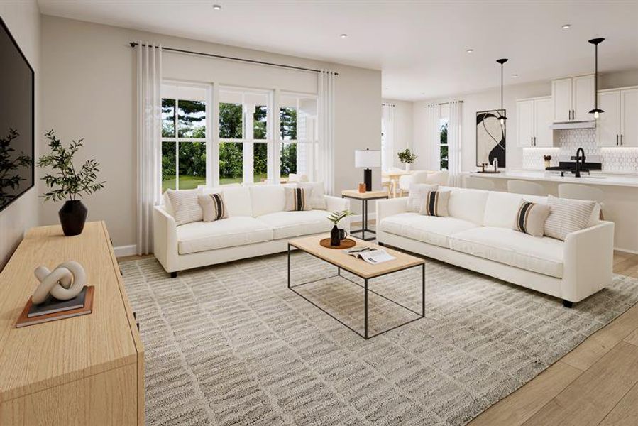 Open‑concept kitchen and living area perfect for hosting and everyday gatherings.