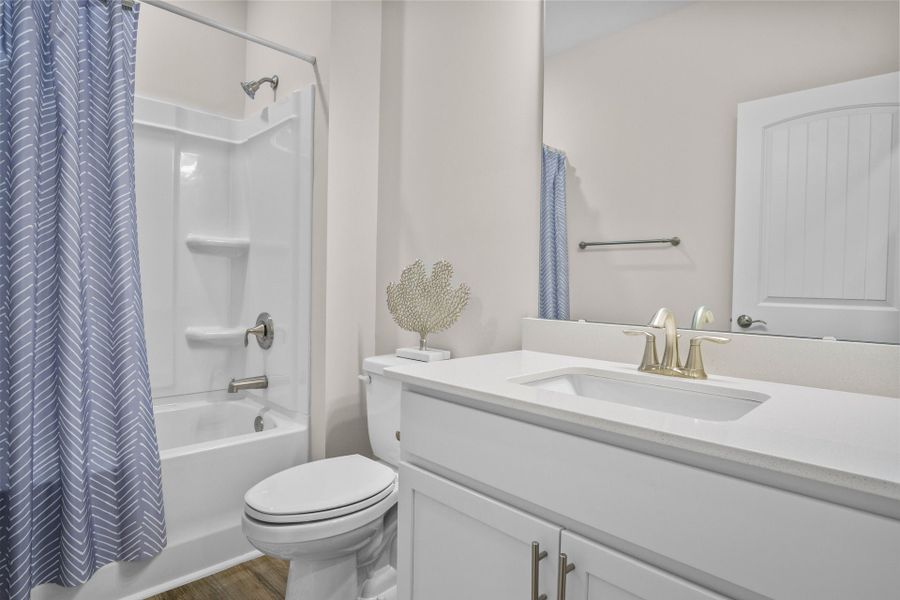 Furnished interior in a model home at The Paired Villas at Bridgewater in Little River (Image 8).