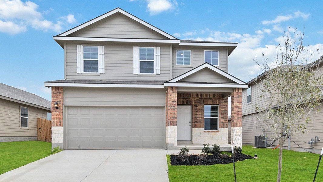 Front exterior of a home in the Blue Ridge Ranch community, located in San Antonio, TX (Image 4).