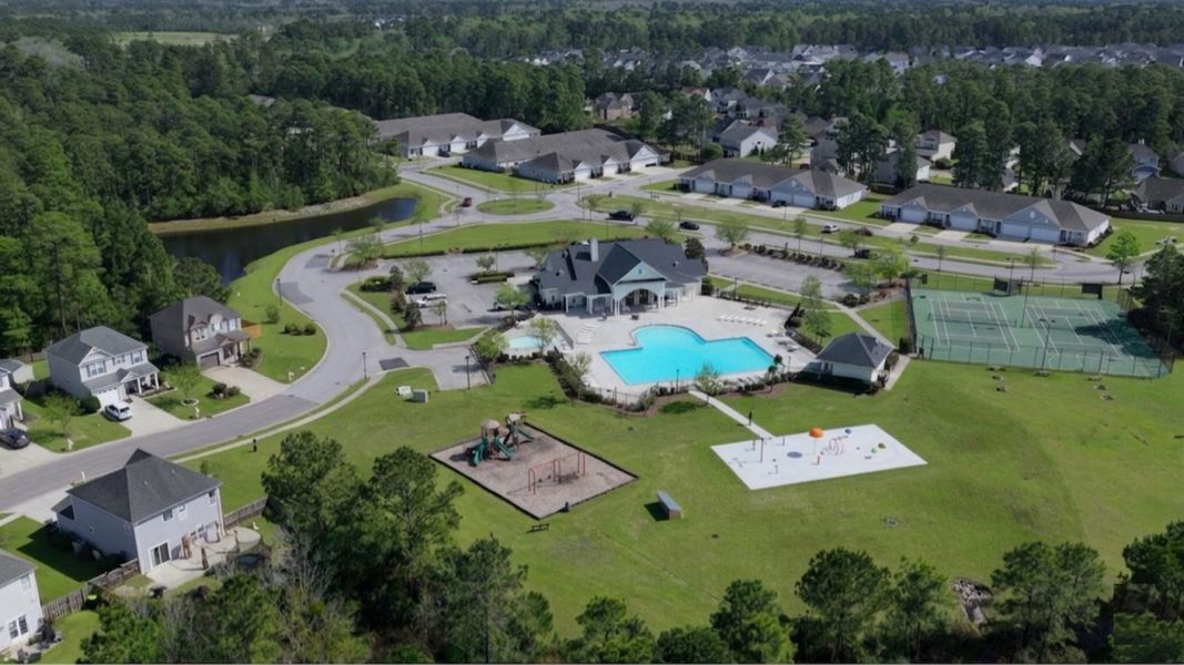 Aerial view of the Grayson Park Townhomes community in Leland, NC, showing layout and nearby surroundings (Image 17).