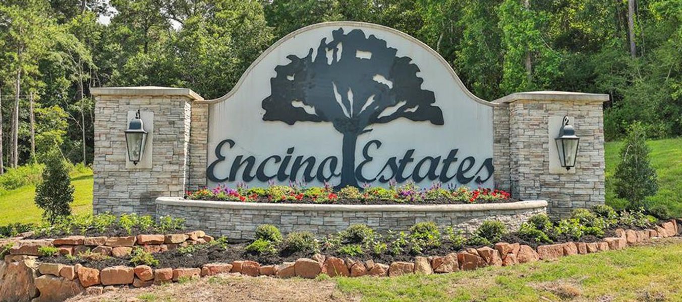 Entrance to the Encino Estates community in Dayton, TX, featuring signage and landscaping (Image 1). Entrance to the Encino Estates community in Dayton, TX, featuring signage and landscaping (Image 1).