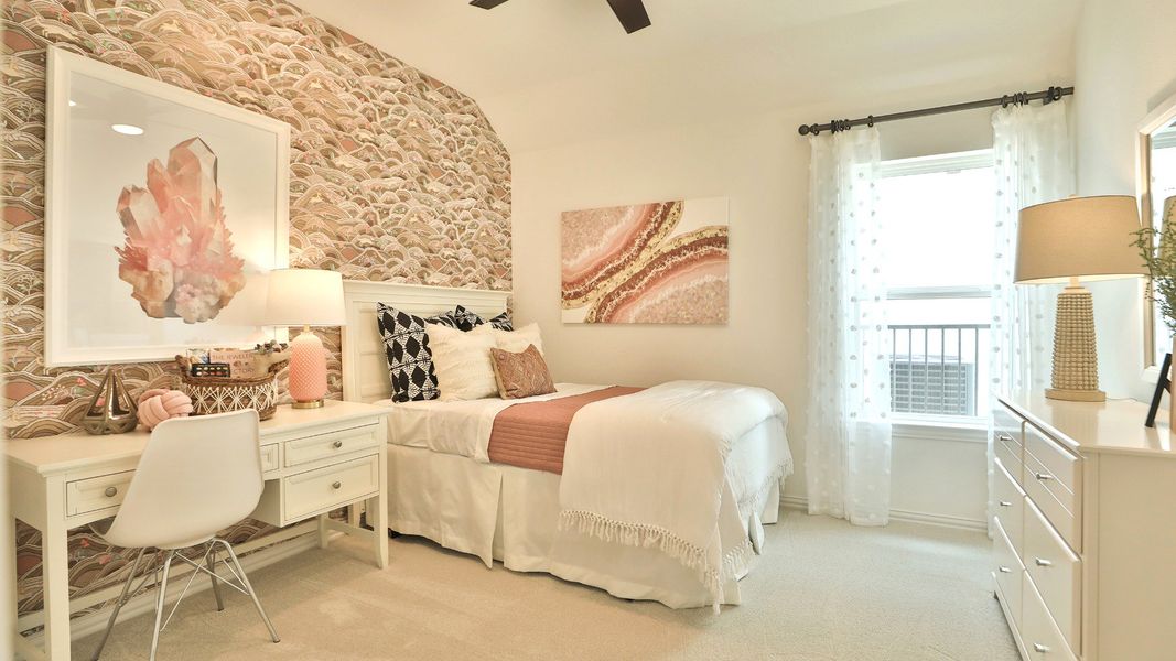 This Bridgeland bedroom boasts textured wallpaper and chic, contemporary furnishings, epitomizing modern elegance. This Bridgeland bedroom boasts textured wallpaper and chic, contemporary furnishings, epitomizing modern elegance.