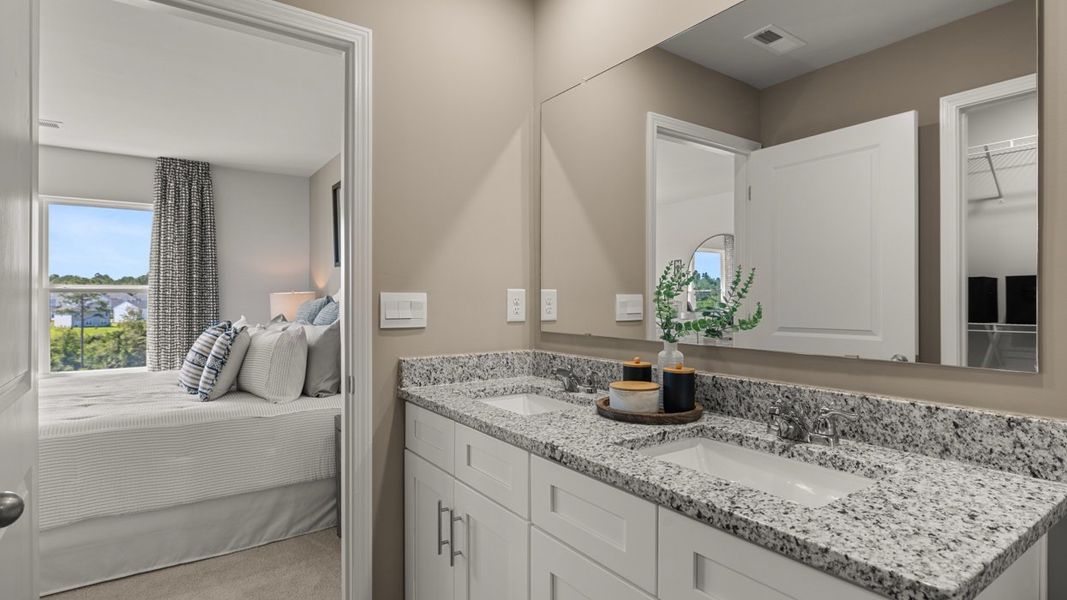 Furnished interior in a model home at Rushing Waters Townhomes in North Augusta (Image 10).