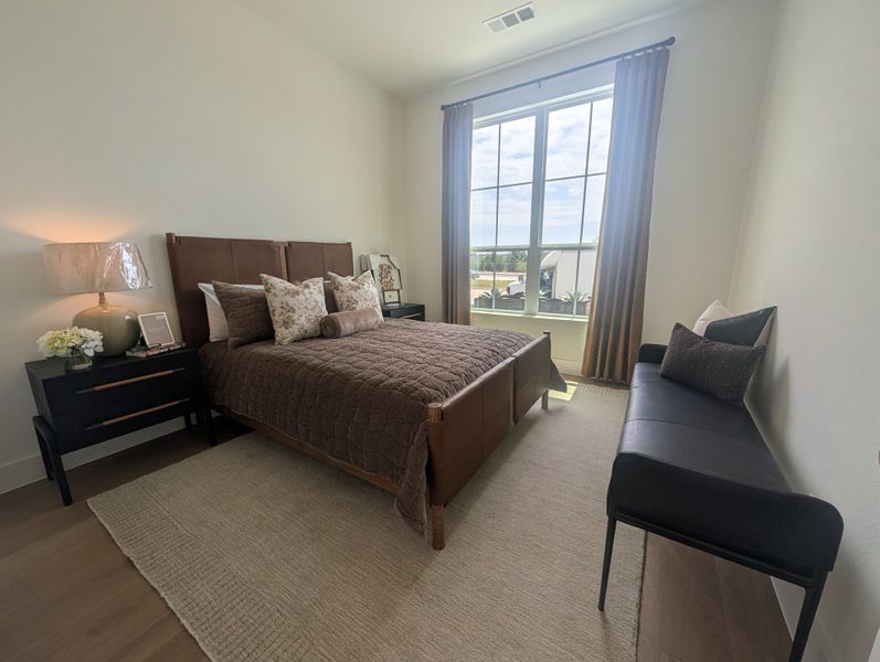 Furnished interior in a model home at Ramble 60s in Celina (Image 6).