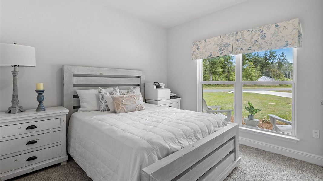 Furnished interior in a model home at Pine Dove Estates in Tallahassee (Image 6).