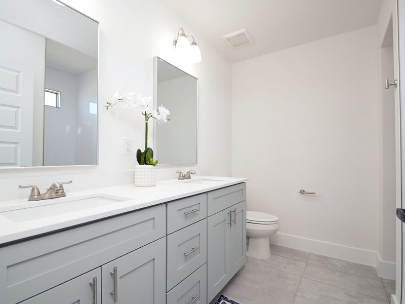 Furnished interior in a model home at Van Cleave in San Antonio (Image 9).