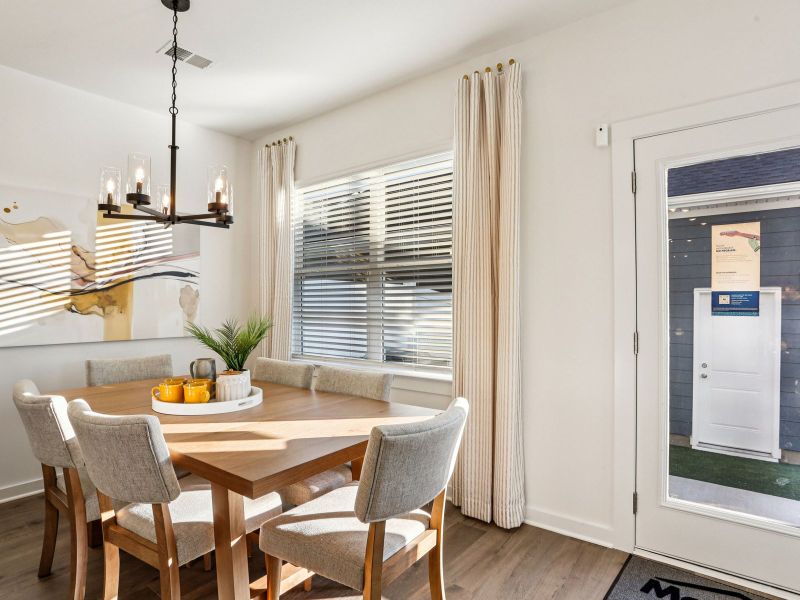 Furnished interior in a model home at Greystone - Vista Townhomes in Smyrna (Image 7).