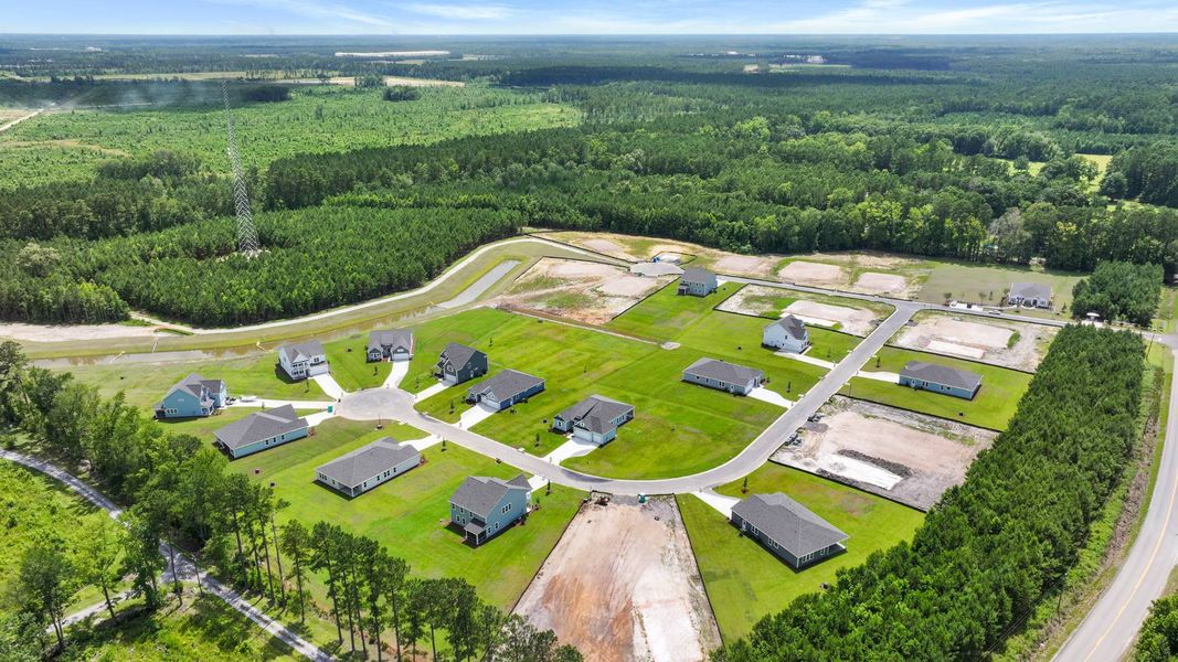 Aerial view of the Berkeley Bay community in Ridgeville, SC, showing layout and nearby surroundings (Image 1).
