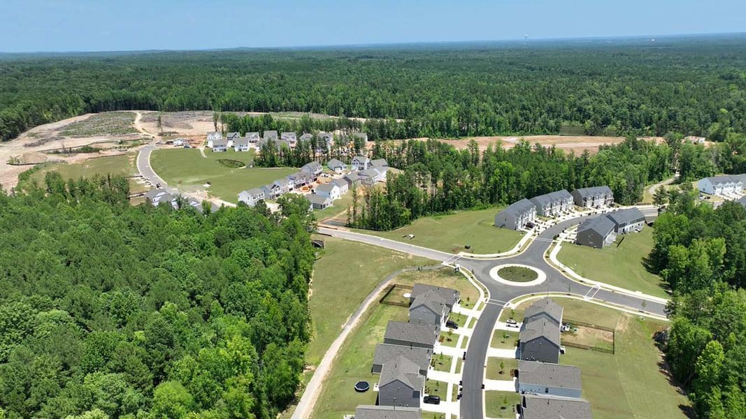 Aerial view of the The Townes at Galvins Ridge community in Sanford, NC, showing layout and nearby surroundings (Image 9).