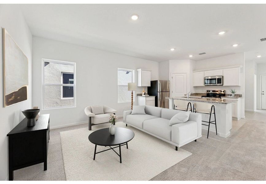 Furnished interior in a model home at Hawks Run in Kissimmee (Image 6).