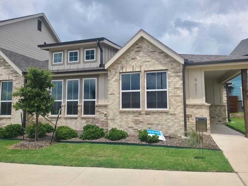 A charming brick home with manicured landscaping in Lake Parc Village Townhomes by Veralux Homes (Fort Worth, TX). A charming brick home with manicured landscaping in Lake Parc Village Townhomes by Veralux Homes (Fort Worth, TX).