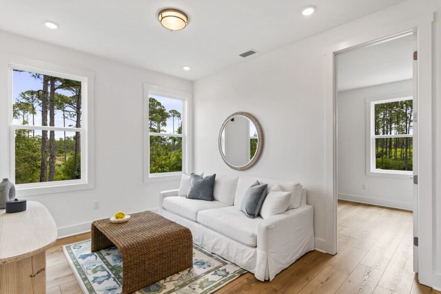Furnished interior in a model home at Brizo in Santa Rosa Beach (Image 8).