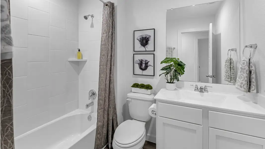Furnished interior in a model home at Alexander Townhomes in Pearland (Image 21).