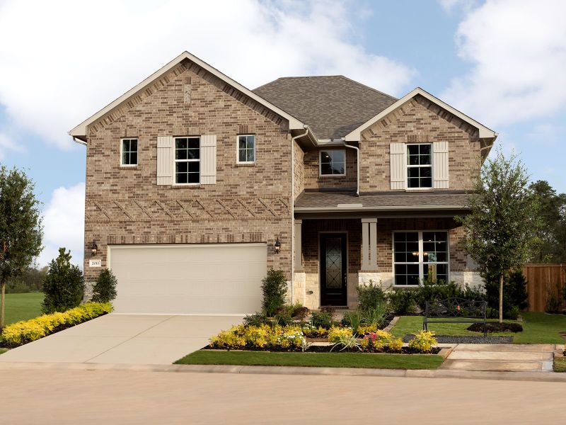 Front exterior of a home in the Montgomery Oaks - Estate community, located in Conroe, TX (Image 16).
