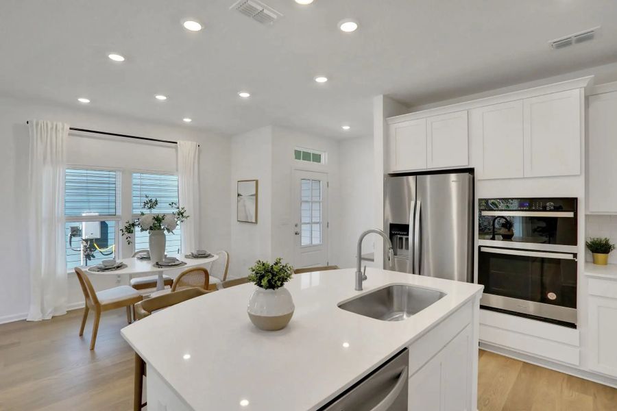 Furnished interior in a model home at Seminole Trace - Villas in Palm Coast (Image 16).