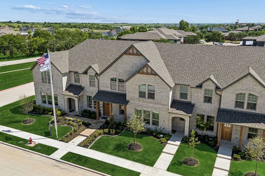 Front exterior of a home in the Sanger Circle – Townhomes community, located in Sanger, TX (Image 34). Front exterior of a home in the Sanger Circle – Townhomes community, located in Sanger, TX (Image 34).