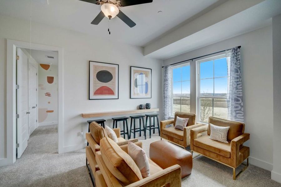 Furnished interior in a model home at Avery Centre in Round Rock (Image 20).