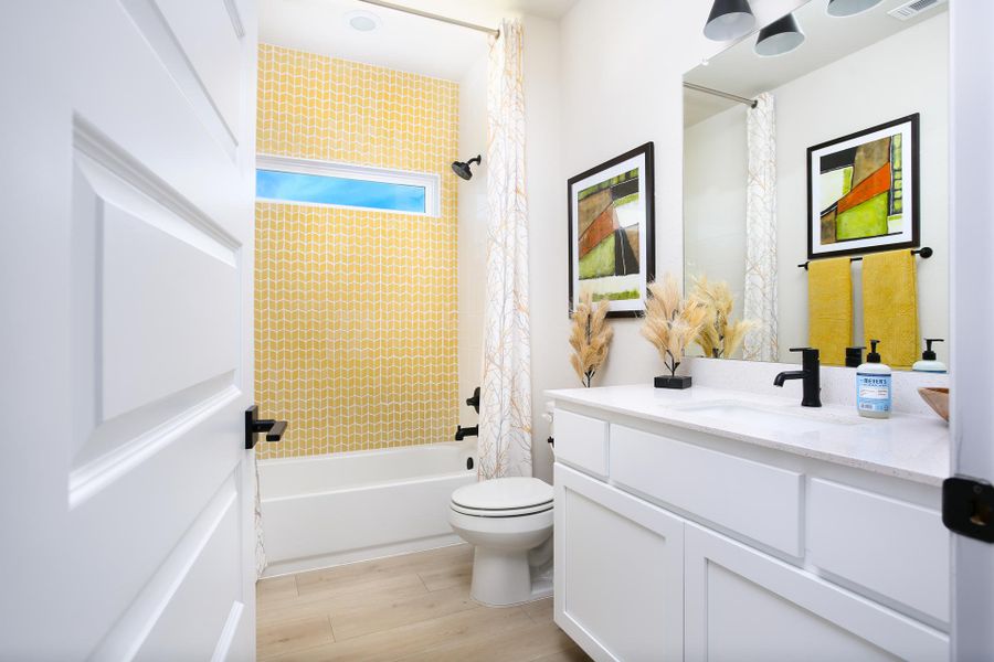 Furnished interior in a model home at Casetta Ranch in Kyle (Image 39).