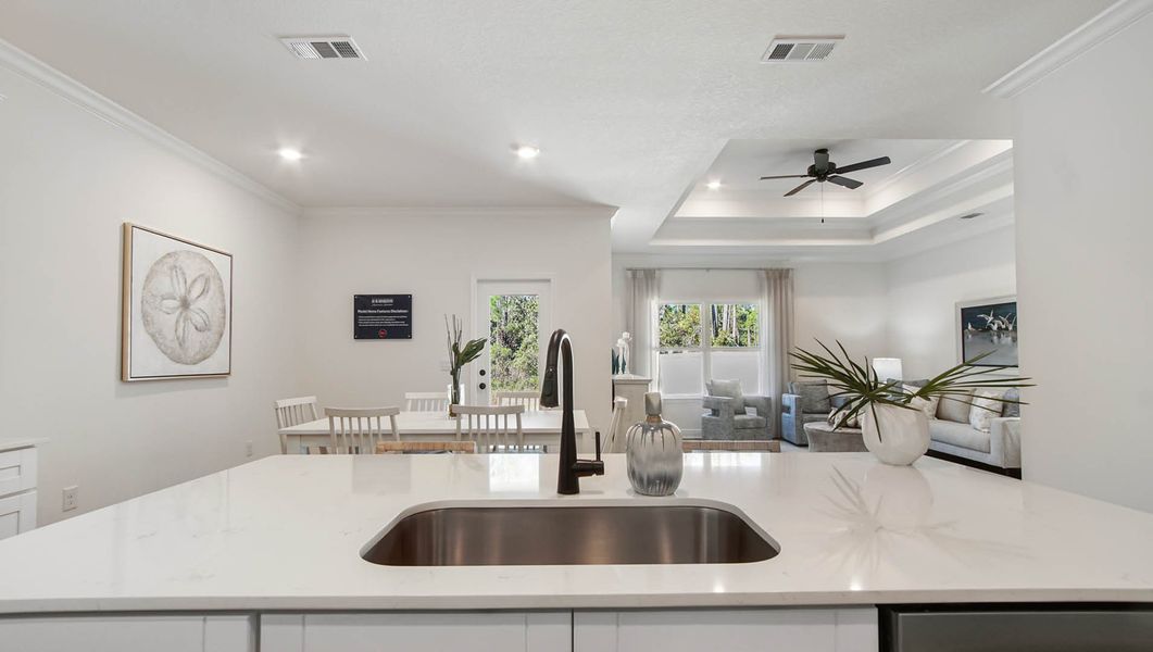 Furnished interior in a model home at Nellie Preserve in Santa Rosa Beach (Image 7).