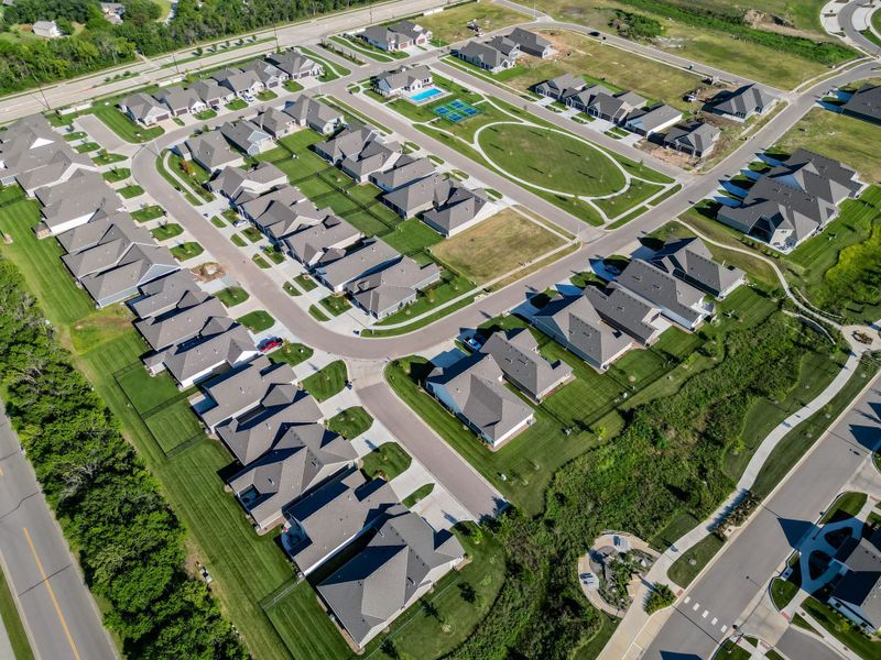 Aerial view of the The Courtyards at The Heritage community in Andover, KS, showing layout and nearby surroundings (Image 9). Aerial view of the The Courtyards at The Heritage community in Andover, KS, showing layout and nearby surroundings (Image 9).