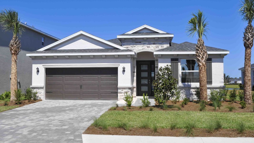 Front exterior of a home in the Legacy Preserve community, located in Parrish, FL (Image 14). Front exterior of a home in the Legacy Preserve community, located in Parrish, FL (Image 14).