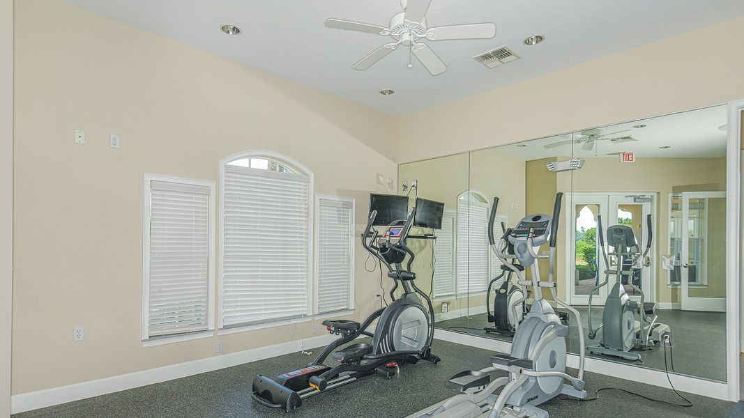 Furnished interior in a model home at Bella Via in Port Charlotte (Image 7).