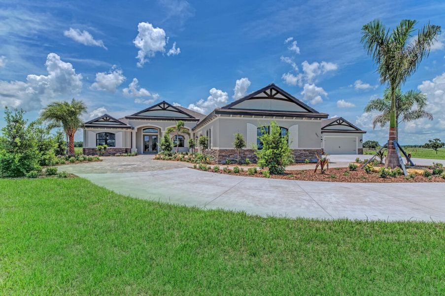 Front exterior of a home in the Hampton Lakes community, located in Sarasota, FL (Image 48).