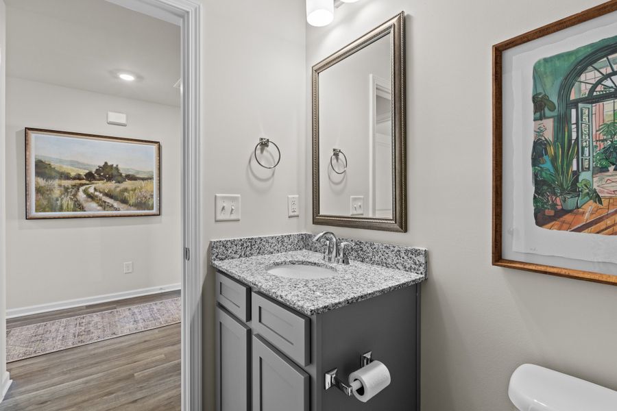 Furnished interior in a model home at Canary Woods in Hopkins (Image 24).