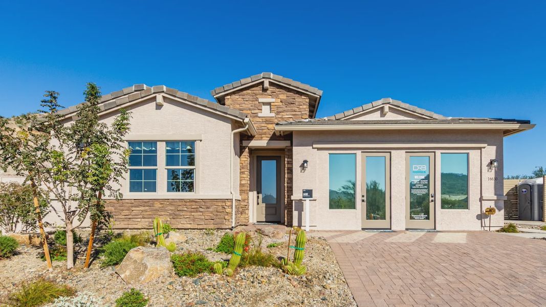 Front exterior of a home in the Hacienda at Estrella community, located in Goodyear, AZ (Image 1).