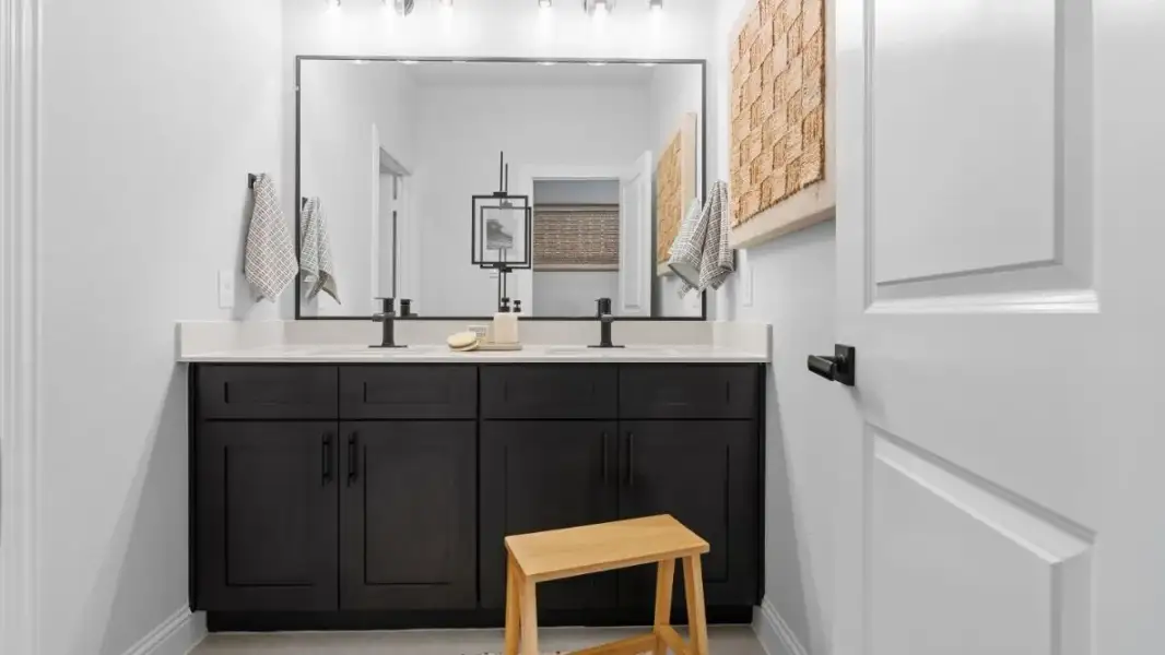 Furnished interior in a model home at Grace Woods in Carrollton (Image 40).