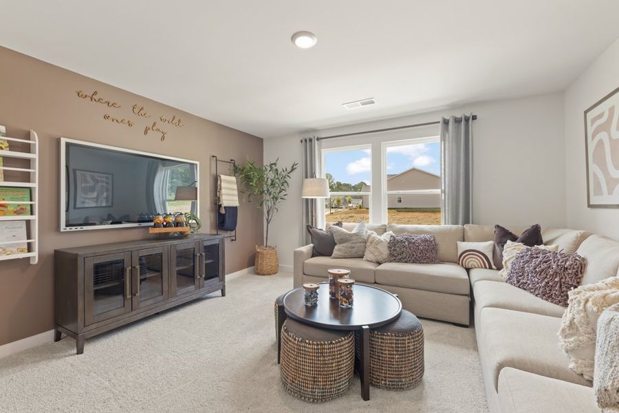 A living room with a fireplace. A living room with a fireplace.