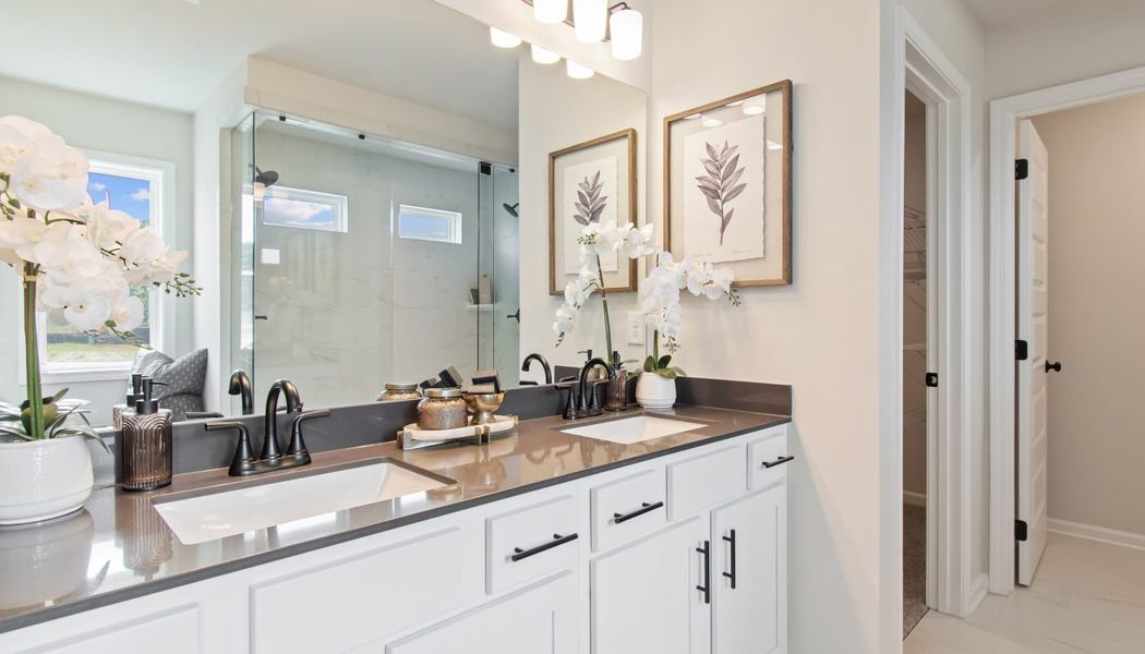 Furnished interior in a model home at Kentmere in Auburn (Image 47).