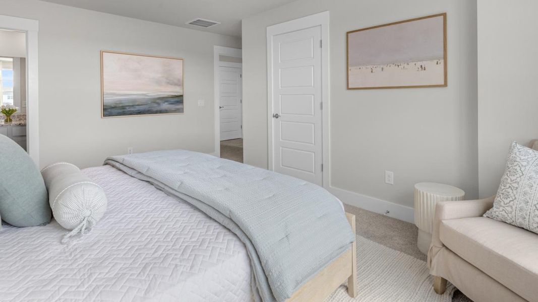 Furnished interior in a model home at The Landing at Sidbury Station in Castle Hayne (Image 27).