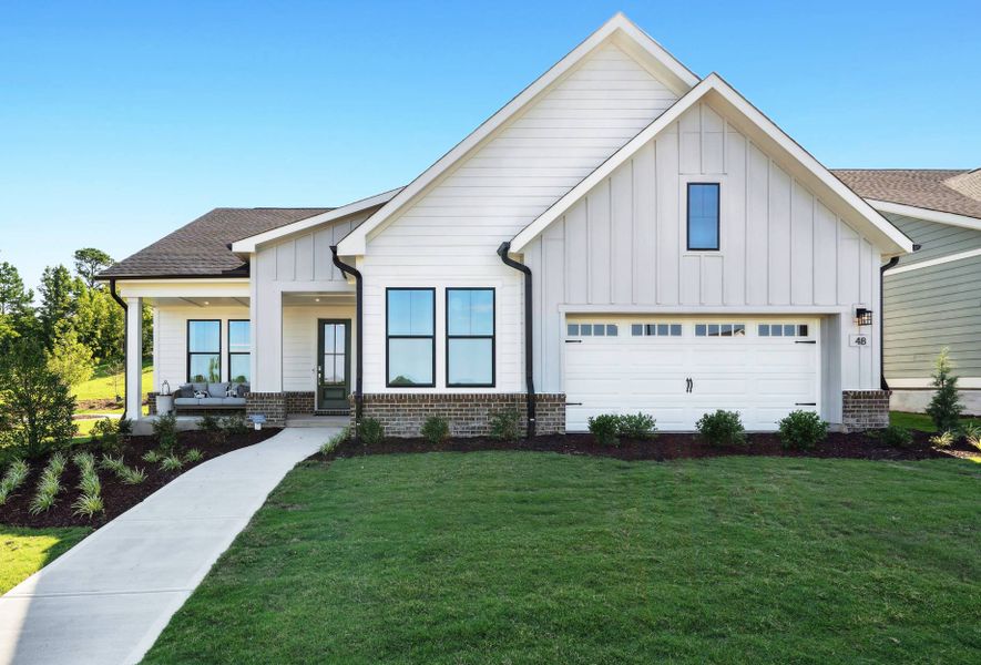 Front exterior of a home in the The Meadows Collection at Serenity community, located in Fuquay Varina, NC (Image 1).