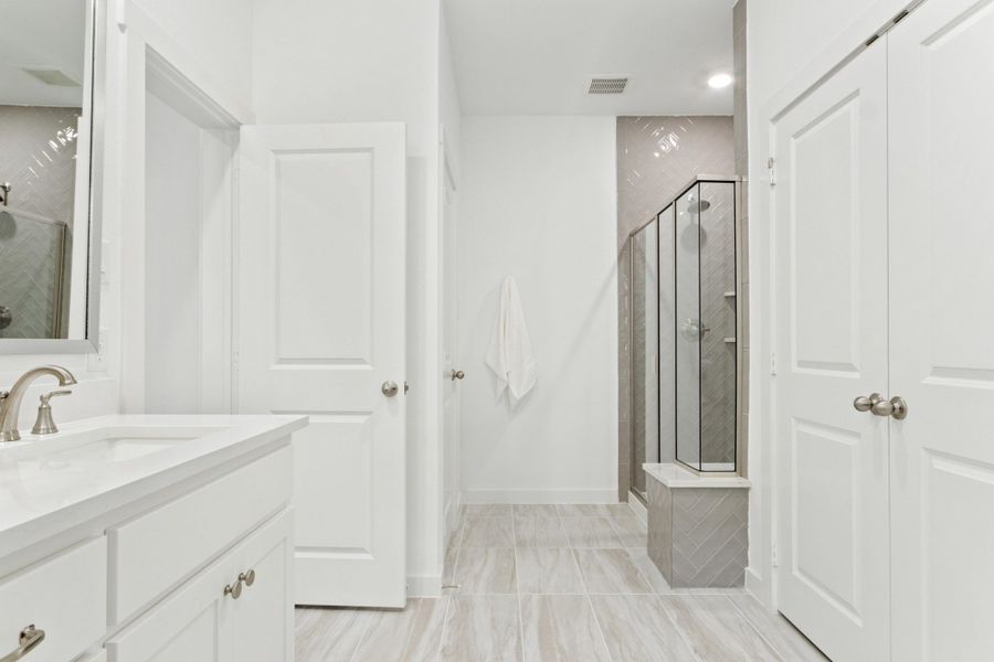 Furnished interior in a model home at Windsong Ranch Townhomes in Prosper (Image 3).