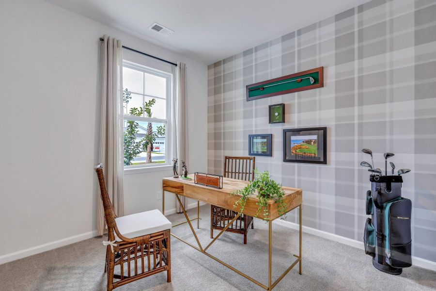 Furnished interior in a model home at Westbrook Retreat Villas at Savannah Quarters in Pooler (Image 19).