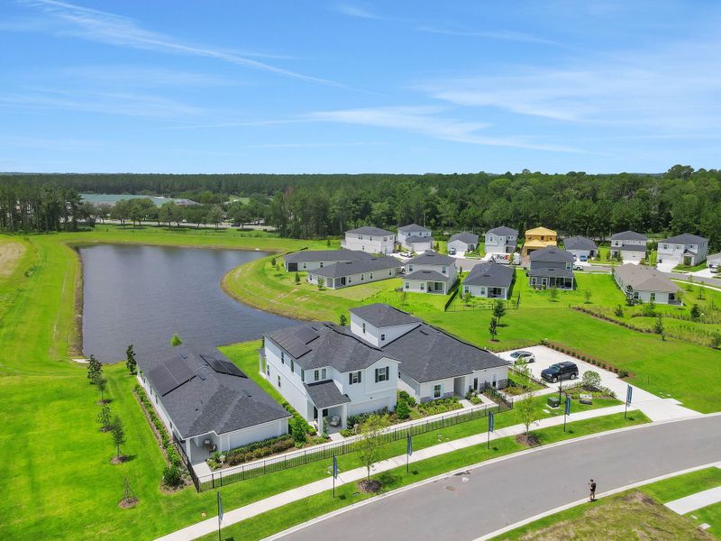Aerial view of the Amberly community in Green Cove Springs, FL, showing layout and nearby surroundings (Image 12). Aerial view of the Amberly community in Green Cove Springs, FL, showing layout and nearby surroundings (Image 12).
