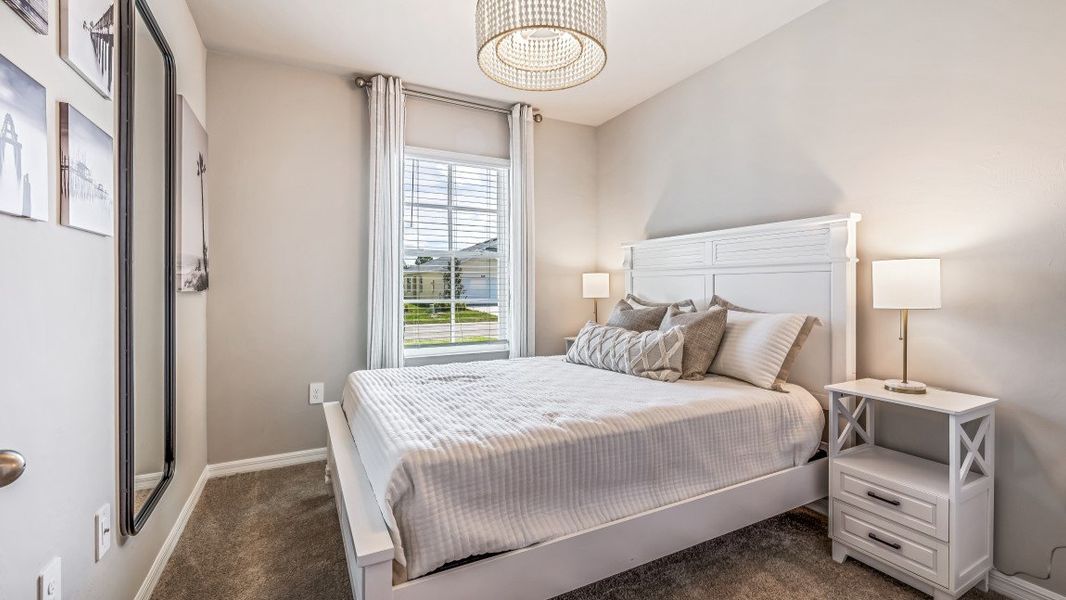 Furnished interior in a model home at Heritage Lake Park in Punta Gorda (Image 27).