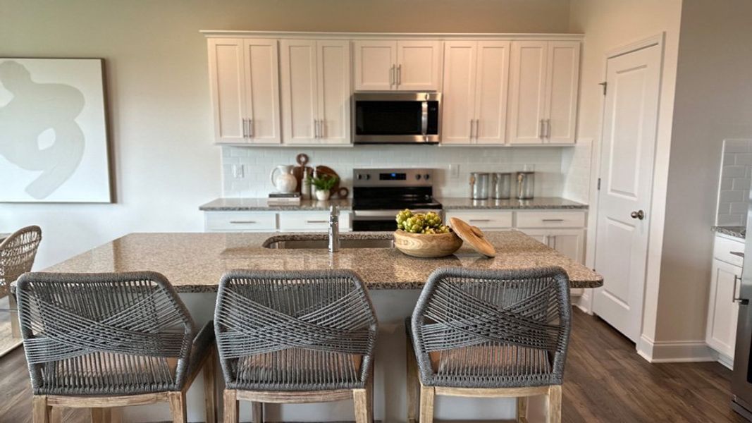 Furnished interior in a model home at Beaver Dam Crossing in Bailey (Image 13).