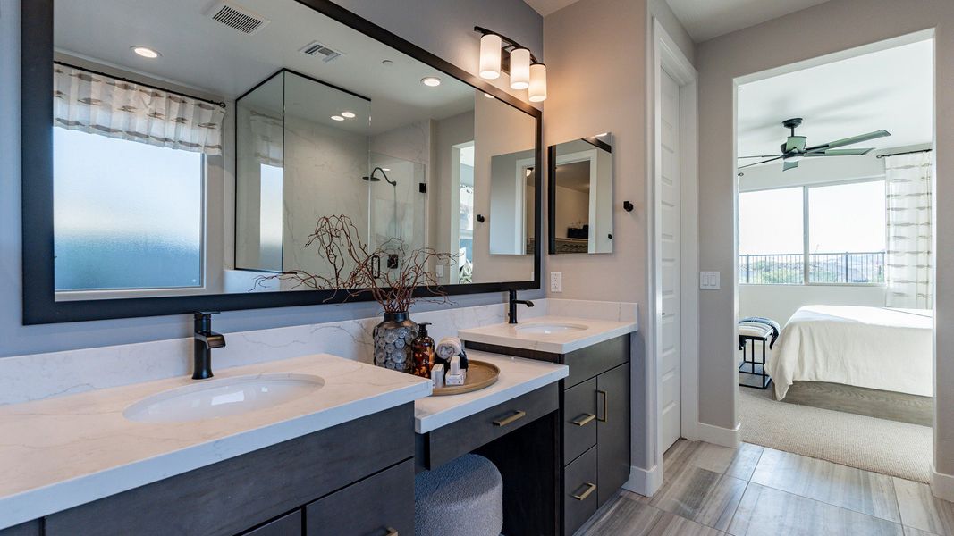 Exquisite marble countertops and sleek cabinetry highlight elegance at The Villas at Mystic.